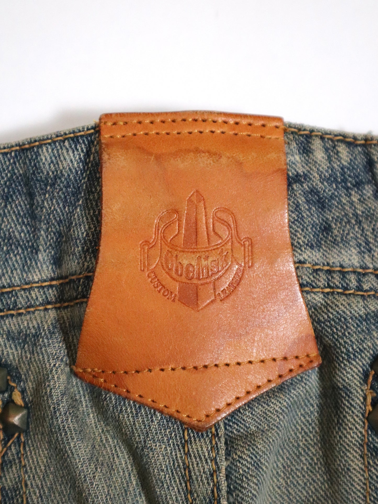 Obelisk Studded & Mud-Washed Bootcut Jeans